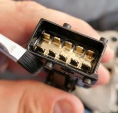 spraying the cleaner again